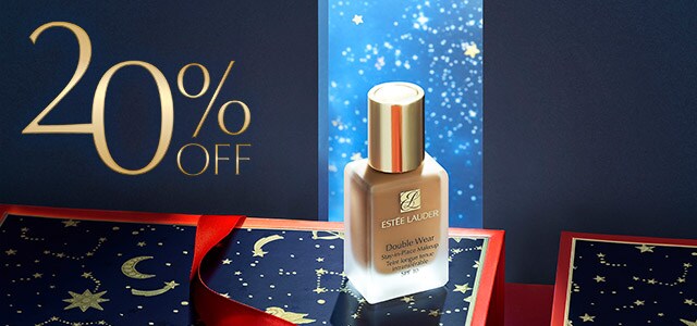 Estée Lauder Double Wear Stay In Place foundation displayed in a red and navy-blue scene with a starry background