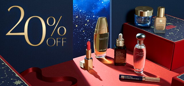 Estée Lauder products from multiple categories, displayed in a red and navy-blue scene with a starry background.